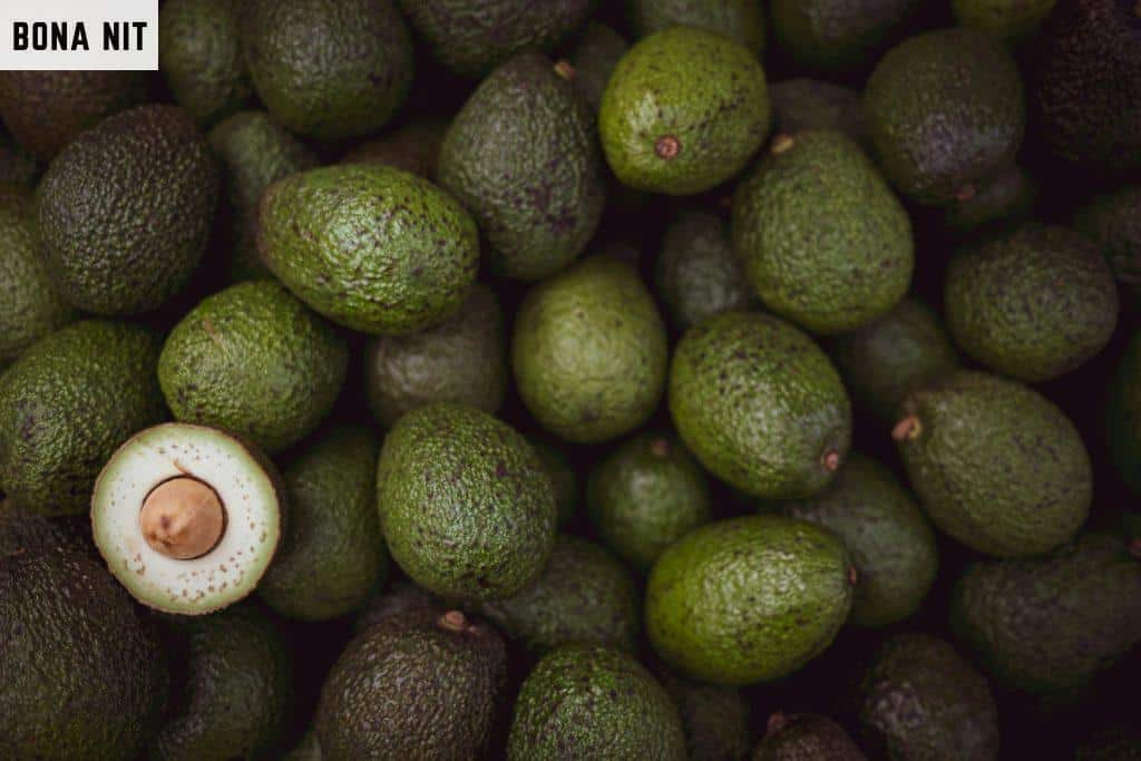 green fruits on black surface